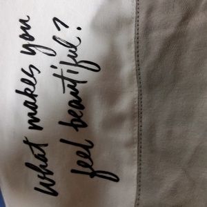 Bare Minerals classic tan and bigger cosmetic bag